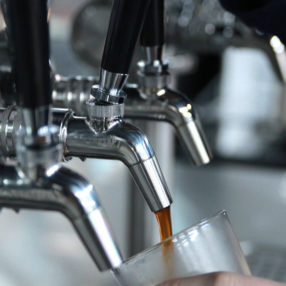 stainless steel ultratap beer tap with beer  image 